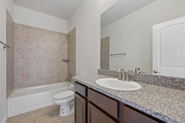 full bathroom featuring bathtub / shower combination, tile patterned floors, toilet, and vanity