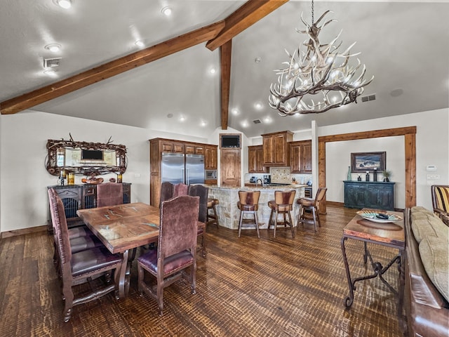 2195 Century Oak Dr, Graford, TX 76449 - dining area with visible vents, high vaulted ceiling, beamed ceiling, and an inviting chandelier