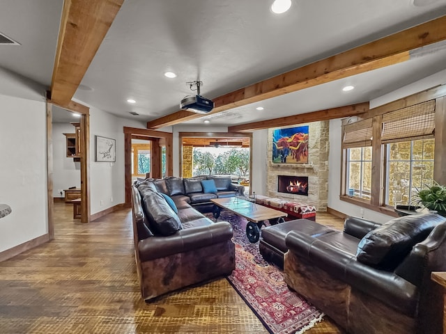 2195 Century Oak Dr, Graford, TX 76449 - living area featuring wood finished floors, baseboards, recessed lighting, a stone fireplace, and beamed ceiling