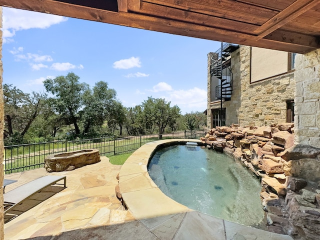 2195 Century Oak Dr, Graford, TX 76449 - view of swimming pool featuring fence and a hot tub