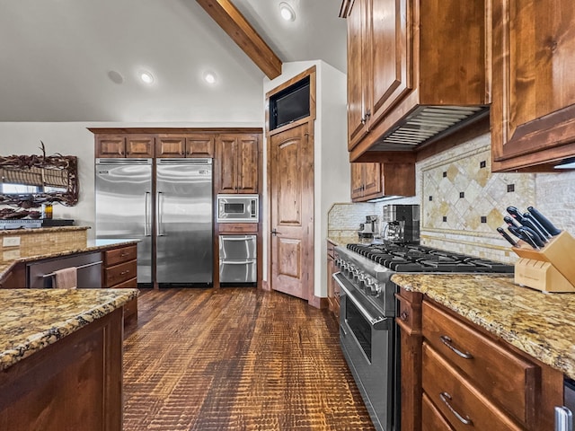 2195 Century Oak Dr, Graford, TX 76449 - kitchen with light stone counters, tasteful backsplash, recessed lighting, built in appliances, and vaulted ceiling with beams