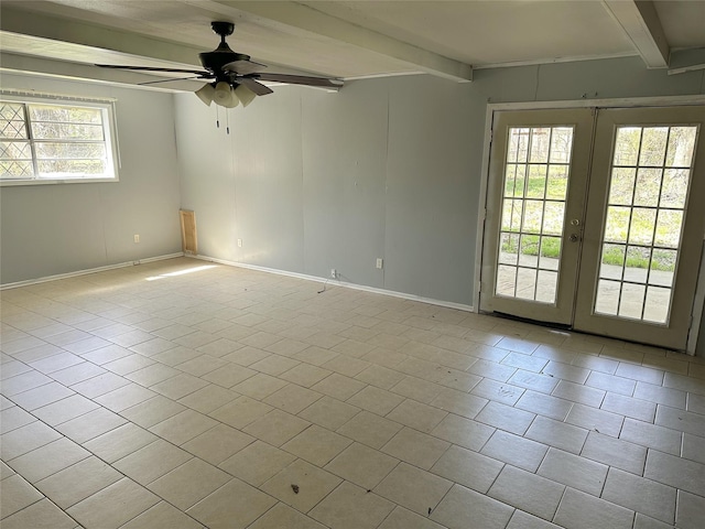 empty room with beam ceiling, french doors, baseboards, and ceiling fan