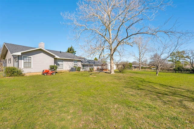 909 Coffield St, Bowie, TX 76230 - view of green lawn
