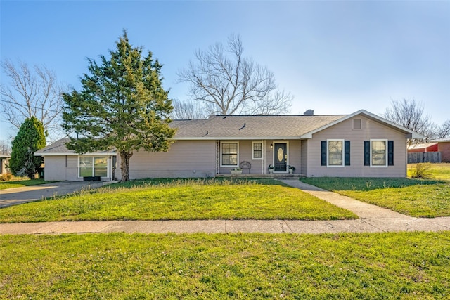 909 Coffield St, Bowie, TX 76230 - ranch-style home with a front yard and covered porch