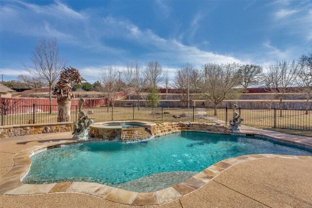 view of pool featuring a patio, a fenced backyard, and a pool with connected hot tub