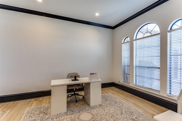 office area featuring crown molding, baseboards, recessed lighting, and light wood-style flooring