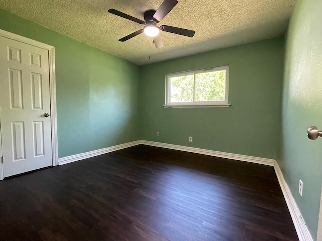 3408 Chaffin Dr, Richland Hills, TX 76118 - spare room featuring a textured ceiling, baseboards, ceiling fan, and dark wood-style floors