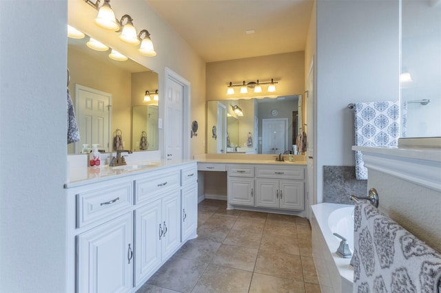 bathroom with tile patterned flooring, a bath, two vanities, and a sink