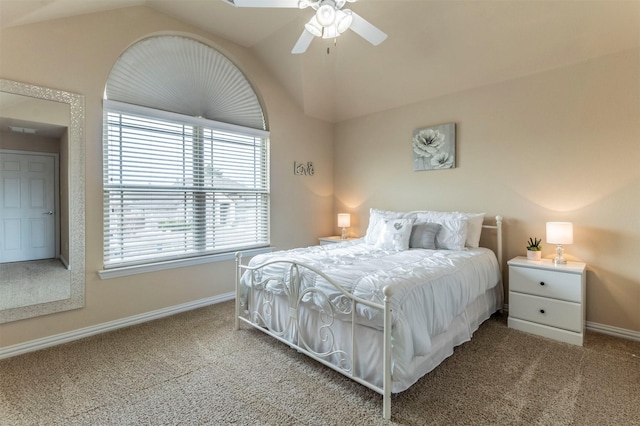 bedroom with lofted ceiling, carpet flooring, a ceiling fan, and baseboards