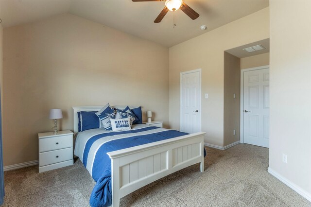 bedroom featuring vaulted ceiling, ceiling fan, baseboards, and carpet floors