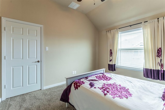 bedroom with baseboards, carpet floors, a ceiling fan, and vaulted ceiling
