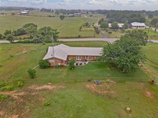 birds eye view of property featuring a rural view