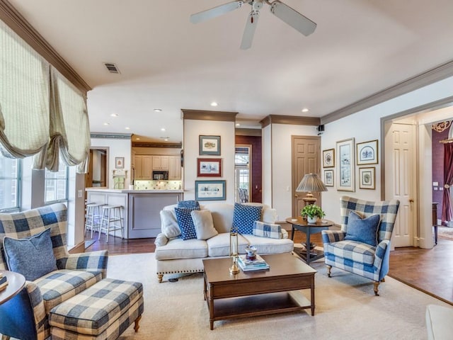 3425 Caleo Ct, Plano, TX 75025 - living area featuring ornamental molding, plenty of natural light, ceiling fan, and recessed lighting