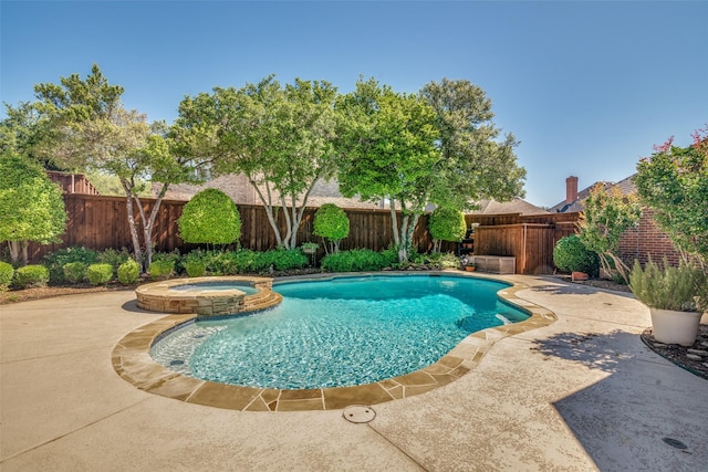 3425 Caleo Ct, Plano, TX 75025 - view of swimming pool featuring a fenced backyard, a pool with connected hot tub, and a patio area
