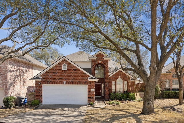 traditional-style home with brick siding, roof with shingles, concrete driveway, and an attached garage