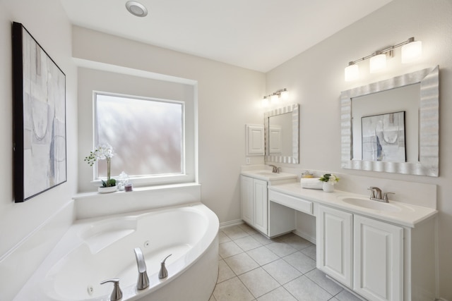 bathroom with tile patterned flooring, double vanity, a whirlpool tub, and a sink