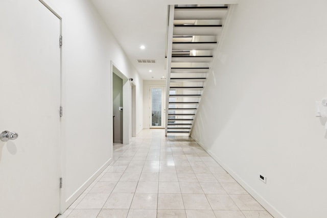 3315 Miro Pl, Dallas, TX 75204 - corridor with light tile patterned floors, recessed lighting, and stairway