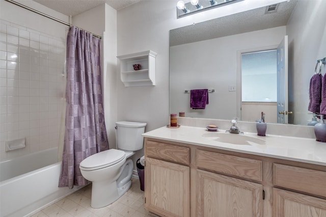 900 Crest Ridge Ct, Irving, TX 75061 - full bathroom with toilet, vanity, shower / bathtub combination with curtain, and a textured ceiling