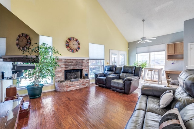 900 Crest Ridge Ct, Irving, TX 75061 - living area with high vaulted ceiling, hardwood / wood-style flooring, ceiling fan, and a fireplace