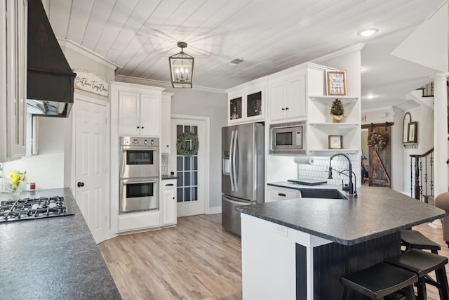 389 Meadow Hill Rd, Fort Worth, TX 76108 - kitchen featuring appliances with stainless steel finishes, a sink, open shelves, dark countertops, and ornamental molding