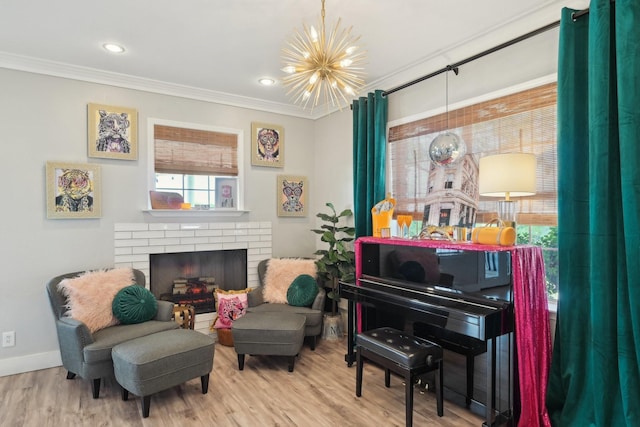 389 Meadow Hill Rd, Fort Worth, TX 76108 - sitting room with a chandelier, crown molding, wood finished floors, a fireplace, and baseboards