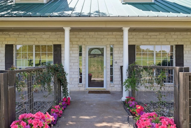 389 Meadow Hill Rd, Fort Worth, TX 76108 - doorway to property with a standing seam roof, covered porch, and metal roof