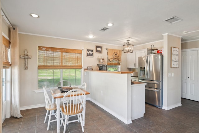 389 Meadow Hill Rd, Fort Worth, TX 76108 - kitchen with stainless steel fridge, white cabinetry, ornamental molding, baseboards, and a peninsula
