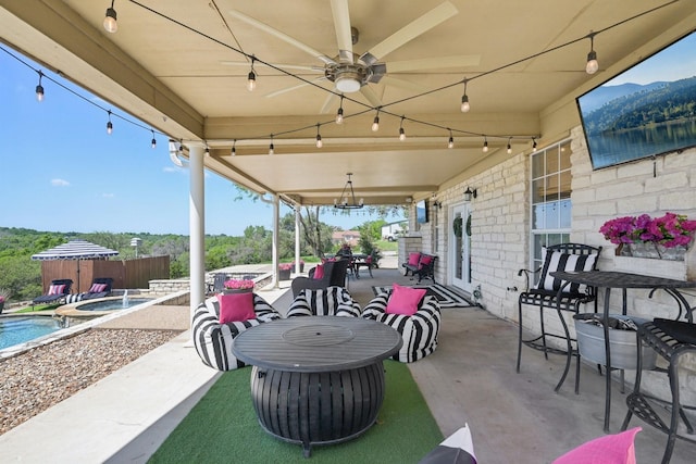 389 Meadow Hill Rd, Fort Worth, TX 76108 - view of patio / terrace with a ceiling fan, an in-ground hot tub, and fence