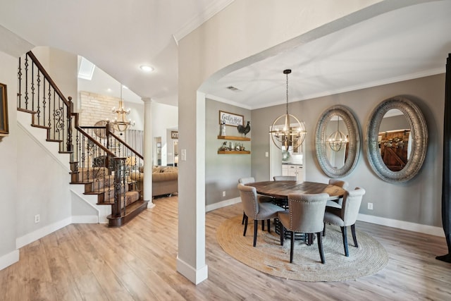 389 Meadow Hill Rd, Fort Worth, TX 76108 - dining room with a chandelier, wood finished floors, stairs, baseboards, and ornamental molding