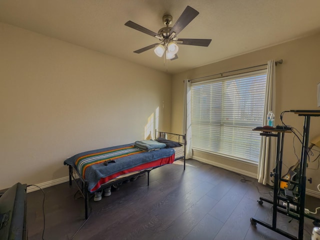 5828 Giddyup Ln, Fort Worth, TX 76179 - bedroom featuring ceiling fan, baseboards, and wood finished floors