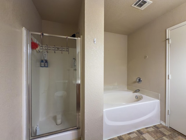 5828 Giddyup Ln, Fort Worth, TX 76179 - full bath with visible vents, a stall shower, and a bath