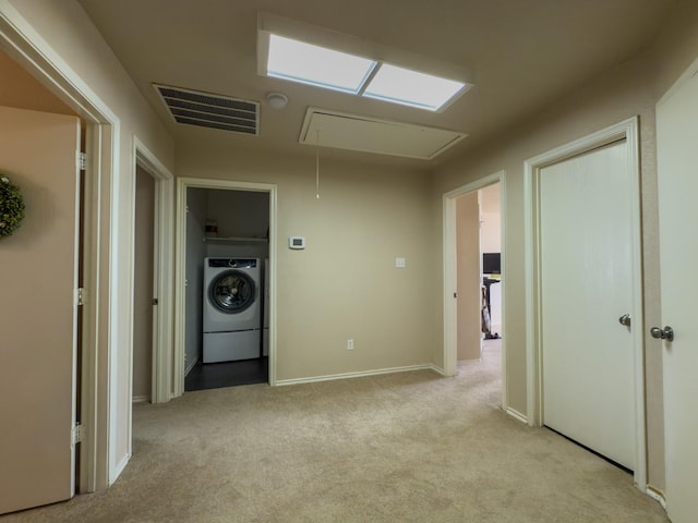 5828 Giddyup Ln, Fort Worth, TX 76179 - laundry room with visible vents, washer / clothes dryer, light colored carpet, attic access, and laundry area