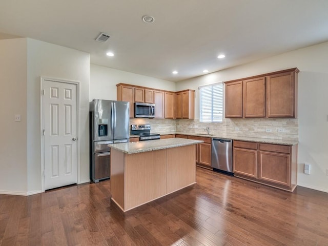 2232 Heaton St, Forney, TX 75126 - kitchen with stainless steel appliances, a sink, backsplash, a center island, and recessed lighting