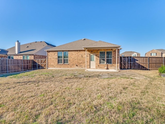 2232 Heaton St, Forney, TX 75126 - back of house with brick siding and a shingled roof