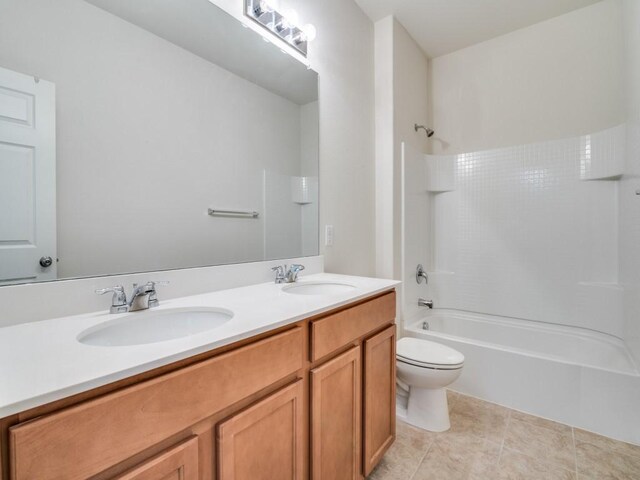 2232 Heaton St, Forney, TX 75126 - bathroom with toilet, double vanity,  shower combination, and tile patterned flooring