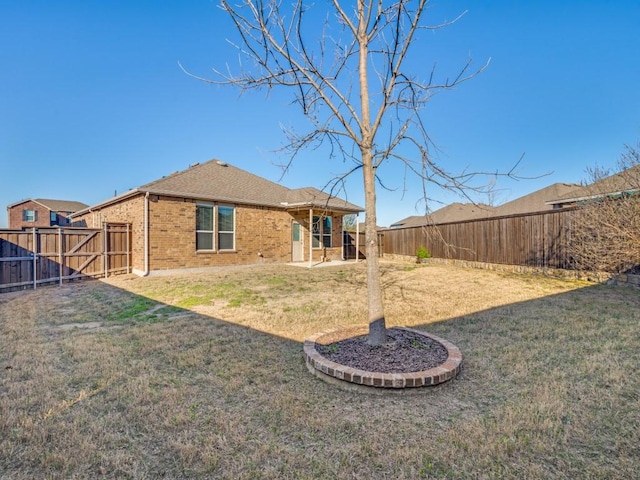2232 Heaton St, Forney, TX 75126 - rear view of house with brick siding