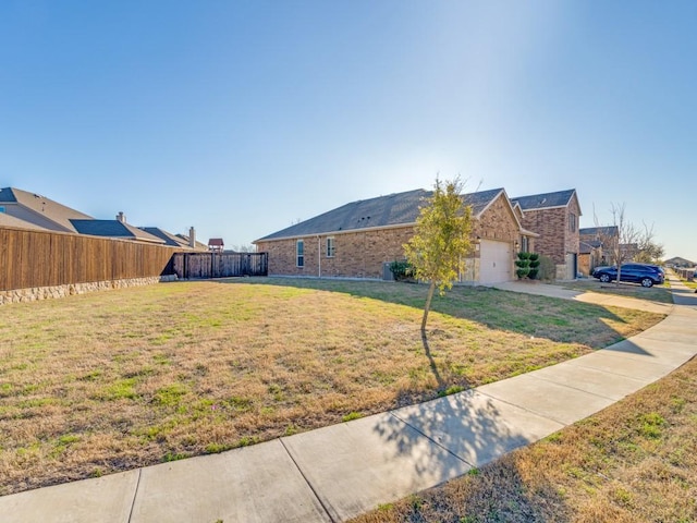2232 Heaton St, Forney, TX 75126 - view of yard featuring concrete driveway and an attached garage