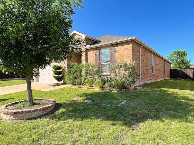 2232 Heaton St, Forney, TX 75126 - view of side of property featuring brick siding, driveway, and an attached garage