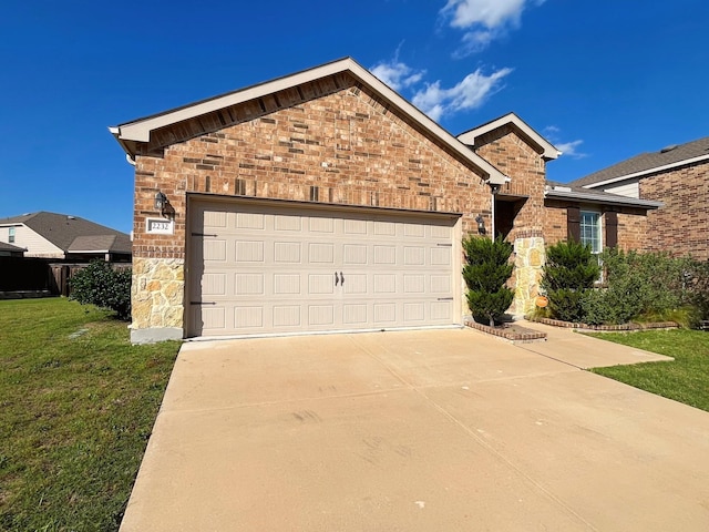 2232 Heaton St, Forney, TX 75126 - view of front of property with stone siding, an attached garage, a front yard, and concrete driveway