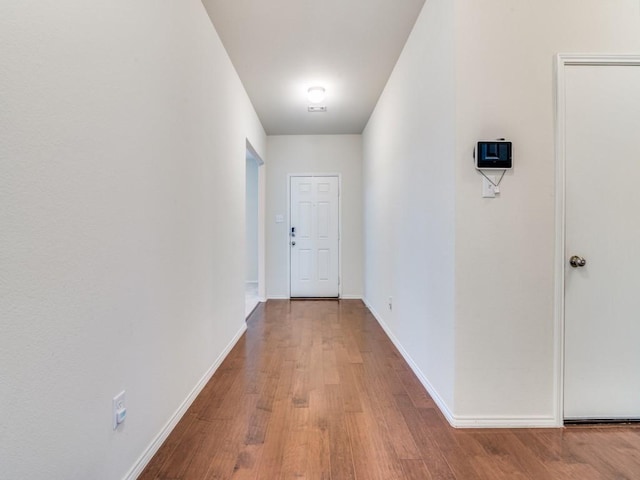 2232 Heaton St, Forney, TX 75126 - hallway with wood finished floors and baseboards