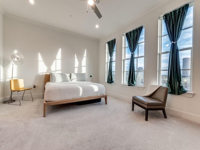 bedroom featuring carpet flooring, baseboards, and ornamental molding