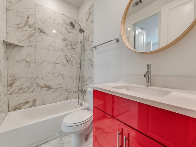 bathroom featuring visible vents, toilet, marble finish floor, shower / bathing tub combination, and vanity