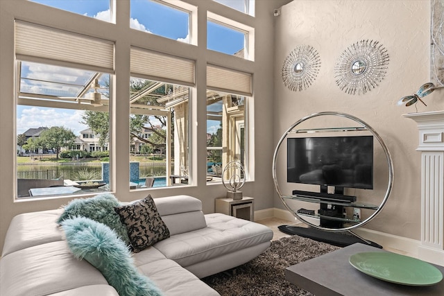 4648 Venetian Way, Frisco, TX 75034 - living room with baseboards and plenty of natural light