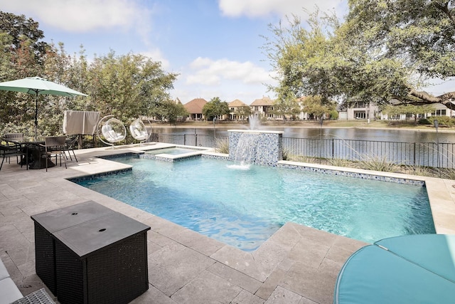 4648 Venetian Way, Frisco, TX 75034 - view of swimming pool with a patio area, fence, a water view, and a pool with connected hot tub