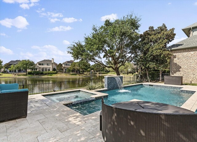 4648 Venetian Way, Frisco, TX 75034 - view of swimming pool featuring a fenced backyard, a patio, a water view, and a pool with connected hot tub