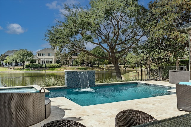 4648 Venetian Way, Frisco, TX 75034 - view of pool featuring fence, a water view, a patio, and a pool with connected hot tub