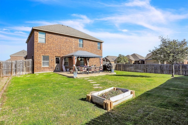 1380 Levi Ln, Forney, TX 75126 - back of property featuring a patio, a fenced backyard, a gazebo, a yard, and brick siding