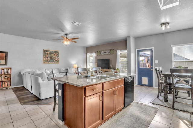 1380 Levi Ln, Forney, TX 75126 - kitchen featuring a kitchen island with sink, dishwasher, open floor plan, and light tile patterned flooring