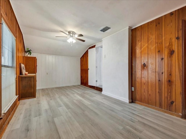 1402 Murphy Ave, Lufkin, TX 75904 - bonus room with light wood finished floors, wooden walls, a ceiling fan, baseboards, and vaulted ceiling
