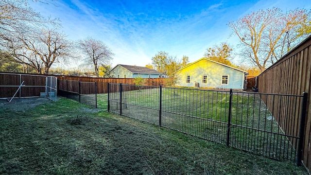 view of yard featuring a fenced backyard